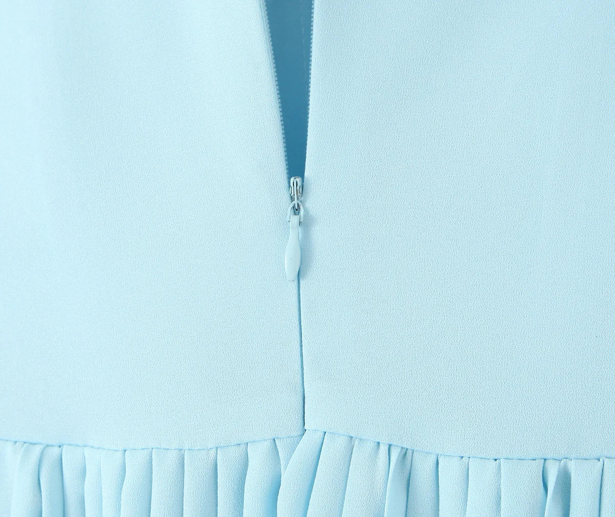 one-shoulder dress with pleated skirt