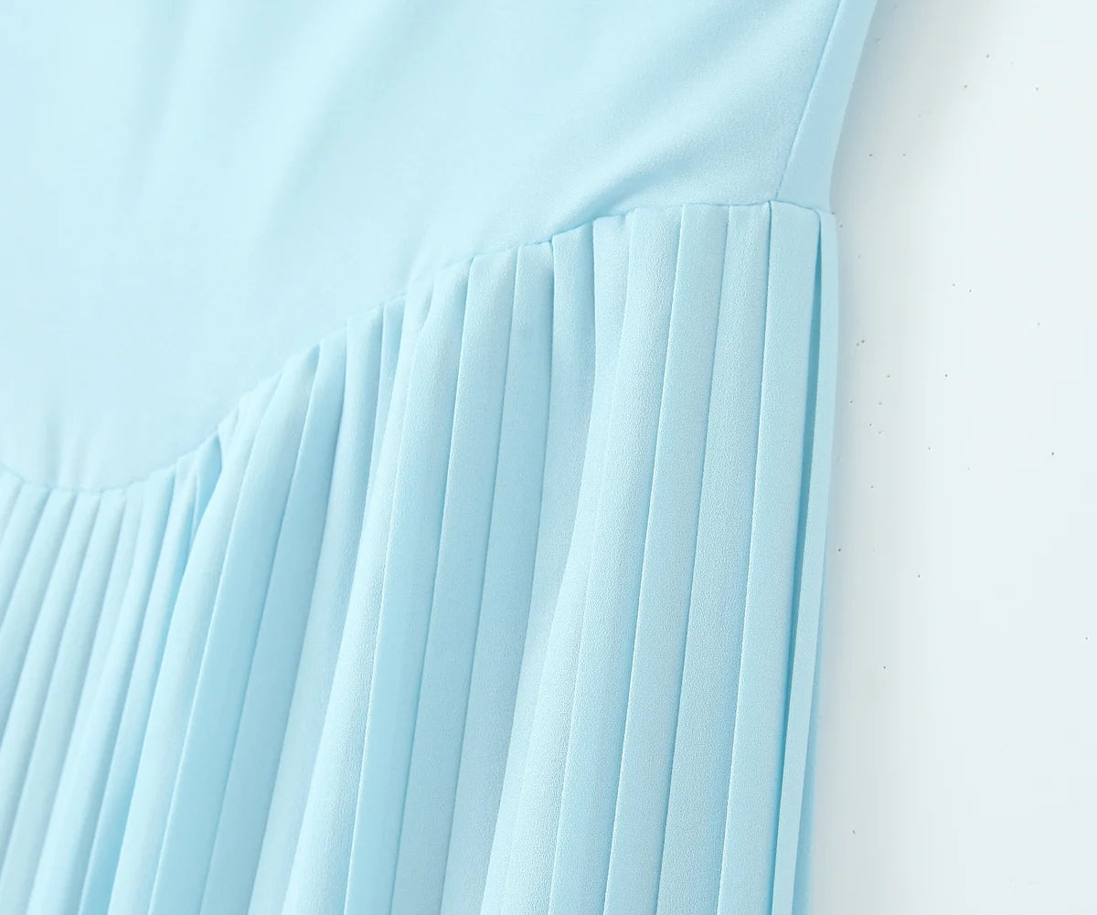 one-shoulder dress with pleated skirt