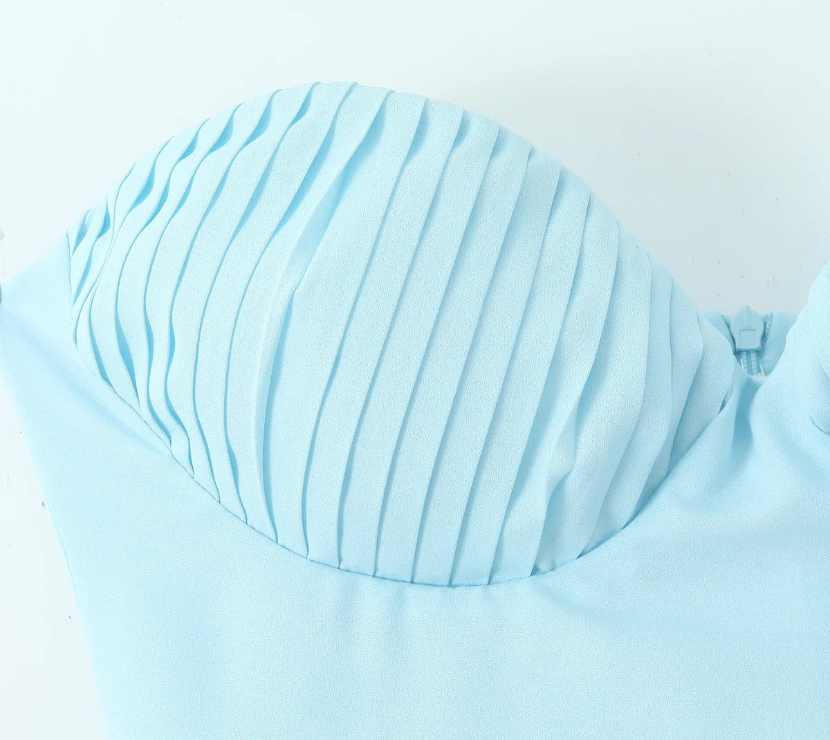 one-shoulder dress with pleated skirt